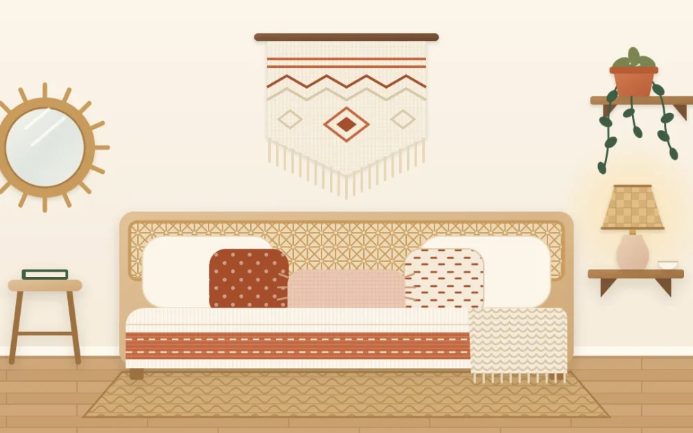 A small boho bedroom with layered cream and rust bedding, one large woven hanging, a narrow wall shelf with a lamp, a round mirror and a trailing plant